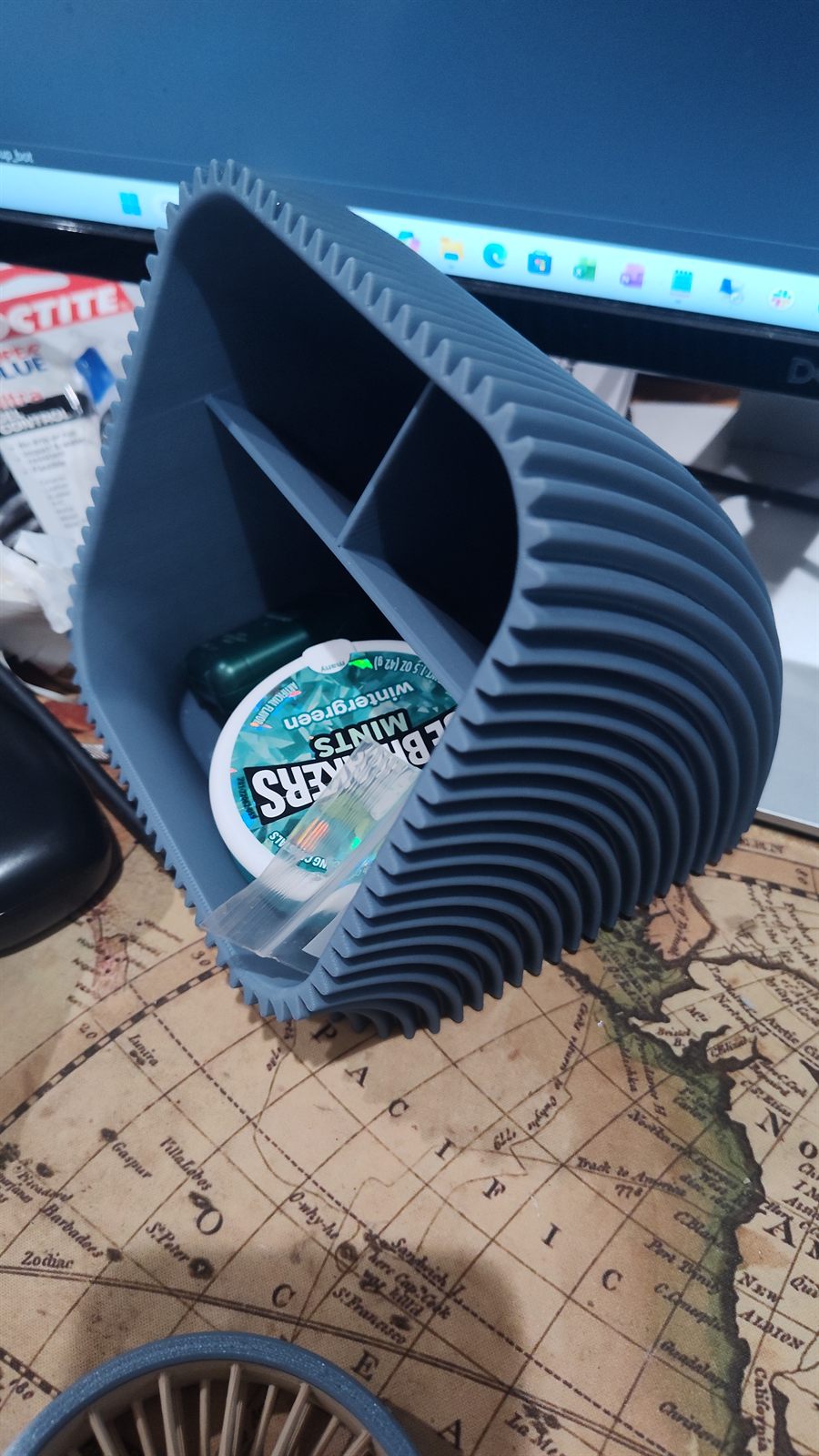 A printed desk organizer with multiple compartments