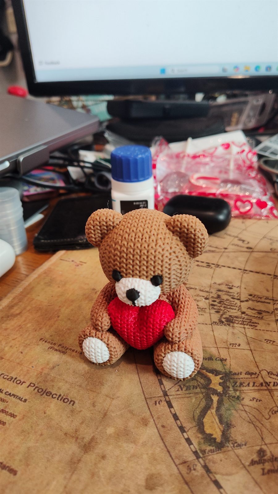 A printed knitted-style bear