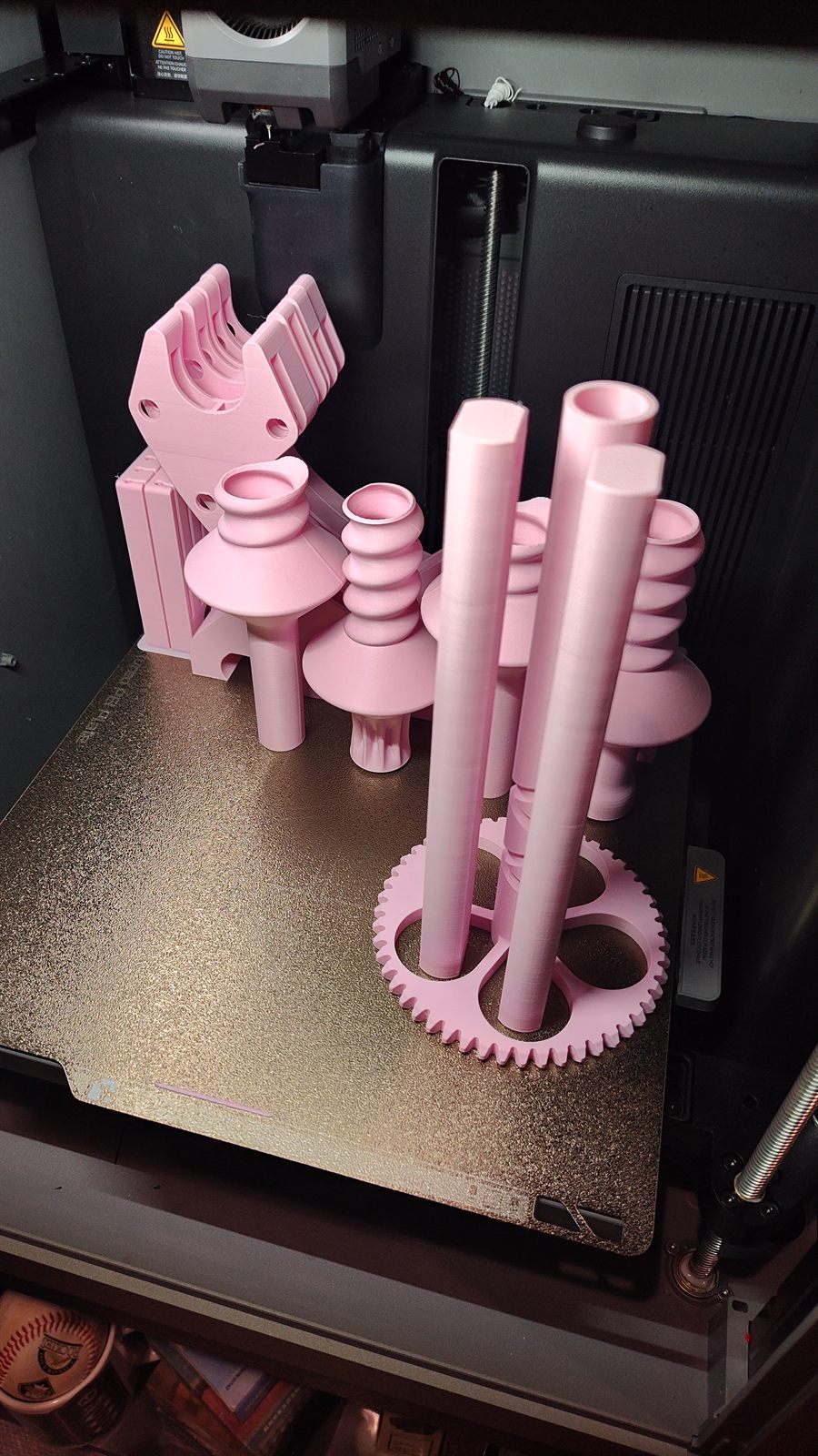 A pasta-machine-style filament spooler for winding bulk filament onto empty spools