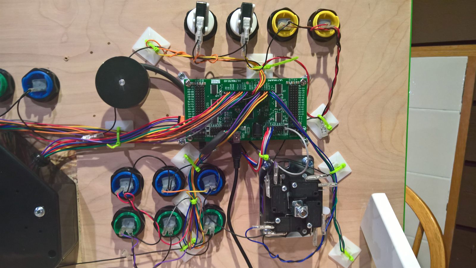 Detailed view of partially completed wiring around the I-PAC board