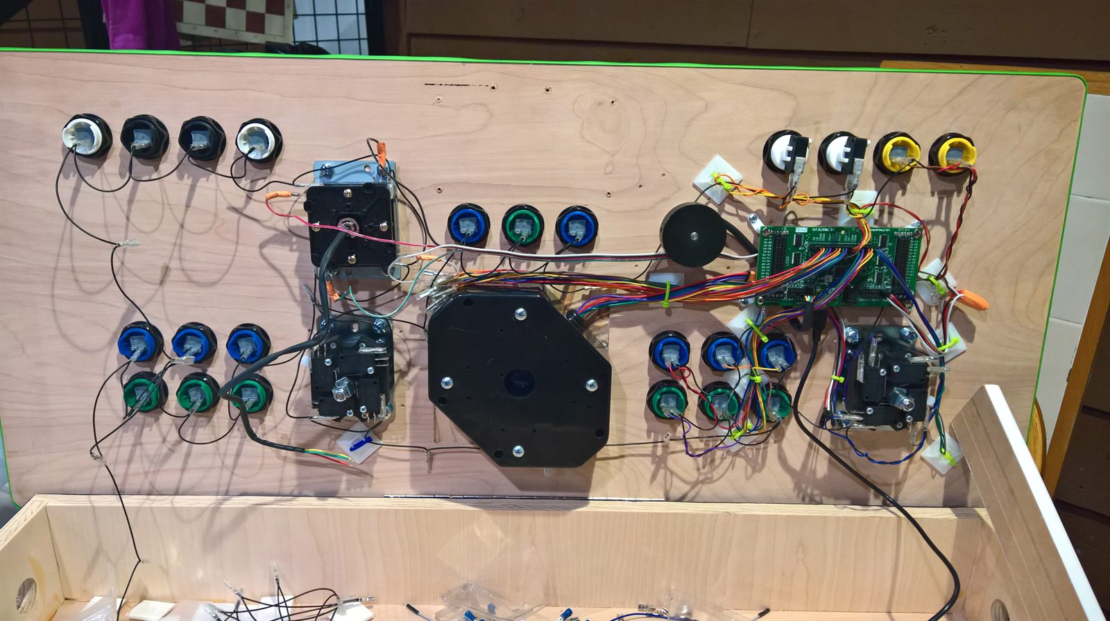 Full panel underside showing complete wiring across both player sides