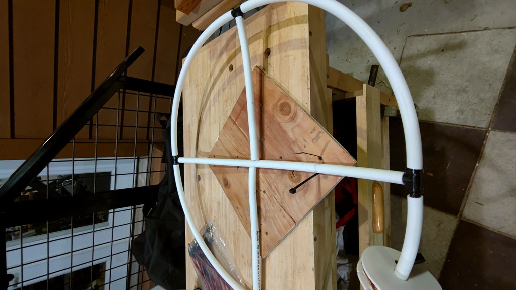 Bottom plywood platform with ring supports fastened in place