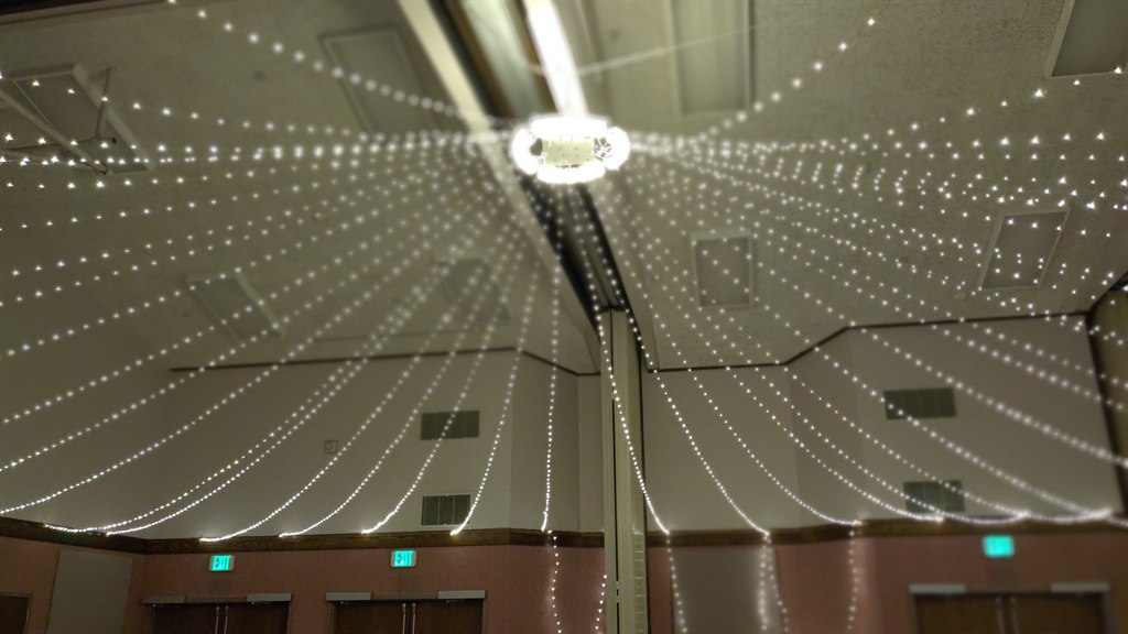 Installed lighting across the room from one angle