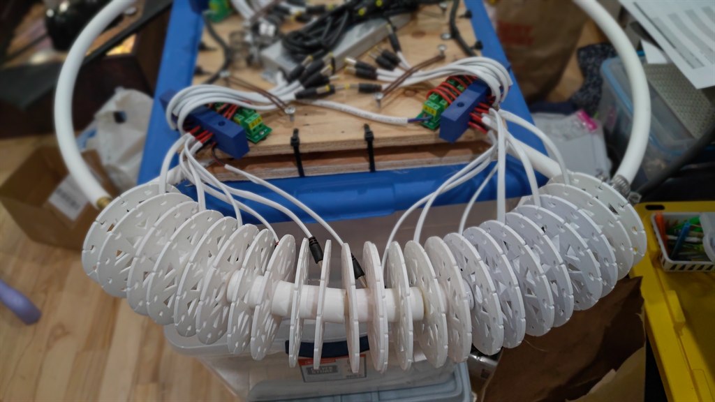 Printed spools and spacers mounted in sequence along one ring section