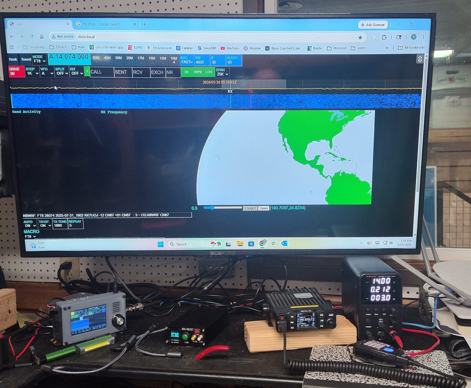 Operating bench with the zBitx HF QRP transceiver, the Retevis RT95 VHF/UHF mobile, a power supply, and a monitor running FT8 software on 20 meters