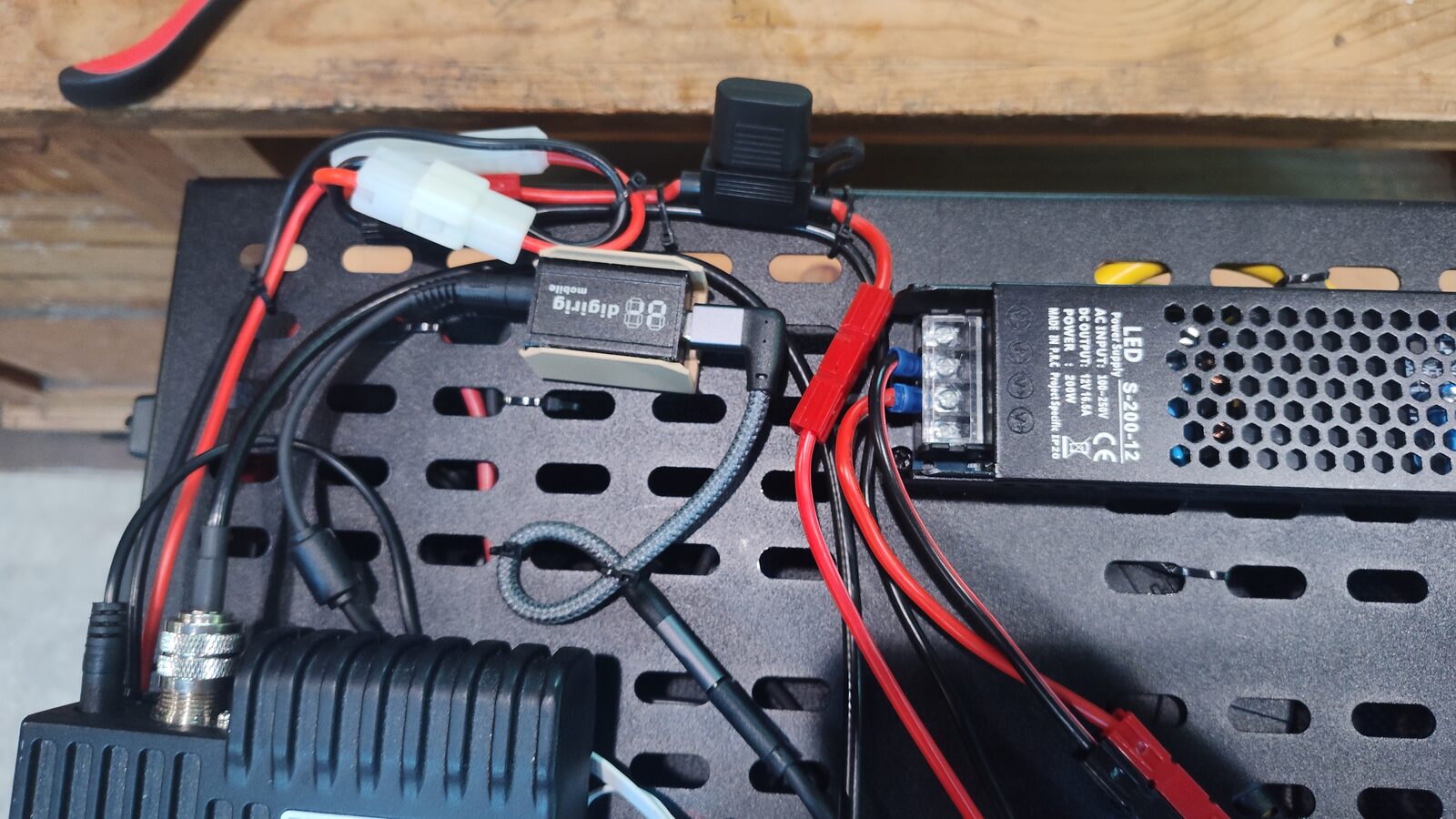 DigiRig moved to the back edge of the shelf with fuse access visible