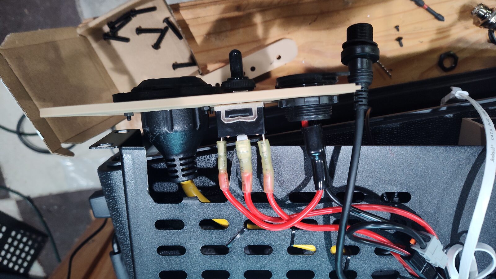 Shelf cutout made for clearance around the AC power outlet